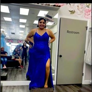 Women’s blue long length formal sequence dress, with thigh high side slit